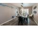Comfortable dining area featuring a modern table, decor, and window that lets natural light into the space at 6251 Tuckaway Cove Ave, Las Vegas, NV 89139
