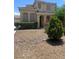 Charming two-story home featuring desert landscaping, adding curb appeal at 6797 Cardoness Ct, Las Vegas, NV 89139