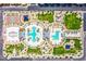 Overhead view of a vibrant community park showcasing a pool, playgrounds, and recreational spots at 6819 Citron Mist Ct, North Las Vegas, NV 89086
