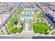Aerial view of community park featuring a swimming pool, playground, and recreational areas at 6819 Citron Mist Ct, North Las Vegas, NV 89086