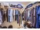 Walk-in closet with ample hanging space, shelving, and shoe storage at 6819 Citron Mist Ct, North Las Vegas, NV 89086