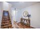 Inviting entryway with wood floors, a staircase, and stylish decor at 6819 Citron Mist Ct, North Las Vegas, NV 89086