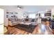 Inviting living room with modern furnishings, stylish decor, and wood-look flooring throughout at 6819 Citron Mist Ct, North Las Vegas, NV 89086