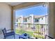 Charming outdoor patio offering a scenic view of the neighborhood and blue sky above at 6819 Citron Mist Ct, North Las Vegas, NV 89086