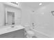 Bathroom featuring a tub-shower combination, a toilet, and a single-sink vanity at 69 Ella Ashman Ave, Henderson, NV 89011