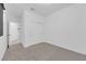 Bedroom features carpet flooring, closet doors, and a bright interior at 69 Ella Ashman Ave, Henderson, NV 89011
