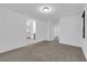 Spacious main bedroom features carpet, ensuite bathroom, and walk-in closet at 69 Ella Ashman Ave, Henderson, NV 89011