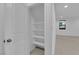 Bright pantry featuring shelving for optimal storage solutions in this well-lit home at 69 Ella Ashman Ave, Henderson, NV 89011