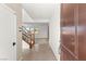 Open concept foyer with staircase and view to the living room at 6901 Whisper Canyon Pl, North Las Vegas, NV 89084
