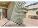 Inviting front entrance with custom wood door and lush landscaping at 6901 Whisper Canyon Pl, North Las Vegas, NV 89084