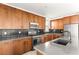 Beautiful kitchen with stainless steel appliances and a modern faucet at 6901 Whisper Canyon Pl, North Las Vegas, NV 89084