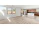 Spacious living room with lots of natural light and access to the backyard at 6901 Whisper Canyon Pl, North Las Vegas, NV 89084