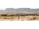 View of neighborhood near mountains with low desert vegetation at 6901 Whisper Canyon Pl, North Las Vegas, NV 89084