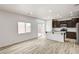 View of eat in kitchen from living room area, with backyard views at 7372 S Palo Real Ct, Las Vegas, NV 89179