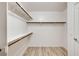 Large walk-in closet providing ample storage with shelves and rod racks at 7372 S Palo Real Ct, Las Vegas, NV 89179