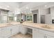 Bathroom with double sinks, lots of counter space, and tile flooring at 7920 Aspect Way, Las Vegas, NV 89149