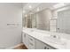 Bathroom with double sinks and lots of counter space featuring decorative fixtures and hardware at 7920 Aspect Way, Las Vegas, NV 89149