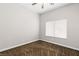 Cozy bedroom with neutral carpet and a window for natural light at 7920 Aspect Way, Las Vegas, NV 89149