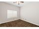 Comfortable bedroom with neutral carpet and natural light from window at 7920 Aspect Way, Las Vegas, NV 89149