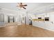 Spacious living area with an open floor plan, tiled flooring, and seamless transitions between rooms at 7920 Aspect Way, Las Vegas, NV 89149
