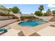 A refreshing backyard pool with landscaped surroundings for outdoor relaxation at 7920 Aspect Way, Las Vegas, NV 89149