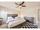 Spacious bedroom with stylish modern furnishings and light-filled at 7928 Violet Dawn St, Las Vegas, NV 89149