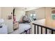 Large bonus room features a hanging chair, window and workout equipment at 7928 Violet Dawn St, Las Vegas, NV 89149