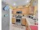 Functional kitchen features stainless steel appliances and updated cabinets at 7950 W Flamingo Rd # 1003, Las Vegas, NV 89147