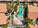 Aerial shot of community pool with spa, set between buildings with a privacy fence at 7950 W Flamingo Rd # 1003, Las Vegas, NV 89147