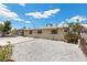 Charming single-story home featuring a gravel yard, mature landscaping, and a cozy curb appeal at 808 Reynolds Ave, North Las Vegas, NV 89030