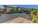 Expansive backyard featuring desert landscape design, ample seating, and natural beauty, perfect for outdoor enjoyment at 8564 Mayport Dr, Las Vegas, NV 89131