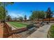 Outdoor bocce ball court with seating and landscaping offering a recreational space for residents at 8564 Mayport Dr, Las Vegas, NV 89131