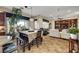 Open concept living room seamlessly connecting the kitchen and dining areas at 8564 Mayport Dr, Las Vegas, NV 89131
