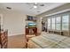The bedroom features natural light, complementing built-in shelves and enhancing the space at 8564 Mayport Dr, Las Vegas, NV 89131