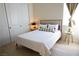 Bedroom with closet, side tables and light wood floors at 862 Silverton Springs St, Henderson, NV 89011
