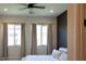 Bright bedroom with light wood floors, recessed lights and bright windows at 862 Silverton Springs St, Henderson, NV 89011