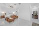 Open concept bedroom featuring modern furniture, ceiling fan, and drink bar at 9 Porto Malaga St, Henderson, NV 89011