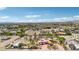 Aerial view showcasing a large property and house with lush backyard, and a tennis court at 9111 W Stephen Ave, Las Vegas, NV 89149