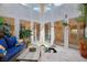 Bright atrium with large windows, seating, a pond feature, and tasteful decor at 9111 W Stephen Ave, Las Vegas, NV 89149
