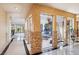 Hallway showcasing marble floors, stone accents, and an open view of the atrium at 9111 W Stephen Ave, Las Vegas, NV 89149