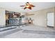 Contemporary living room with marble steps and a view into the kitchen area at 9111 W Stephen Ave, Las Vegas, NV 89149