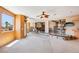 Open-concept living room with a clear view into the dining area and outside at 9111 W Stephen Ave, Las Vegas, NV 89149