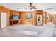 Living room displaying built-in shelving, a window with a scenic view, and neutral colors at 9111 W Stephen Ave, Las Vegas, NV 89149