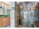 Close up of glass shower with marble walls and built in bench at 9111 W Stephen Ave, Las Vegas, NV 89149