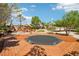 Outdoor trampoline and play structure nestled within a spacious, landscaped backyard at 9111 W Stephen Ave, Las Vegas, NV 89149
