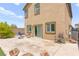 Spacious backyard with patio, seating, and desert landscaping at 9161 Rolling Sky Dr, Las Vegas, NV 89178