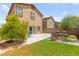 The large backyard has plenty of room and features a blue grilling station with an outdoor table and chairs at 9161 Rolling Sky Dr, Las Vegas, NV 89178