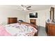 Bedroom with carpet floors, ceiling fan, furniture, and natural light from the window at 9161 Rolling Sky Dr, Las Vegas, NV 89178