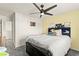 This bedroom features a ceiling fan and closet at 9161 Rolling Sky Dr, Las Vegas, NV 89178