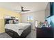 This bedroom has a ceiling fan and closet at 9161 Rolling Sky Dr, Las Vegas, NV 89178